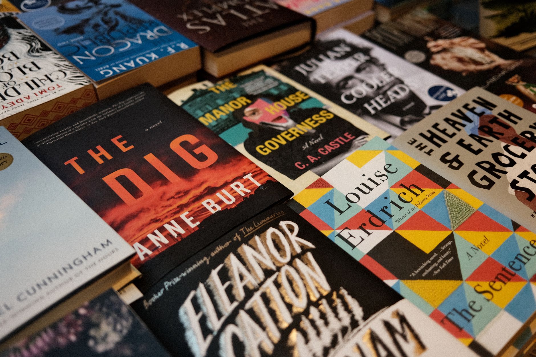 A vibrant display of various book covers in a New York City bookstore.